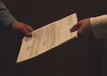 process server delivering legal papers in chatsowrth